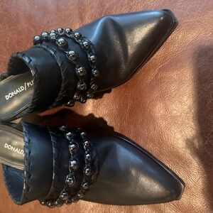 Donald J. Pliner Black Mules with Sleek Design